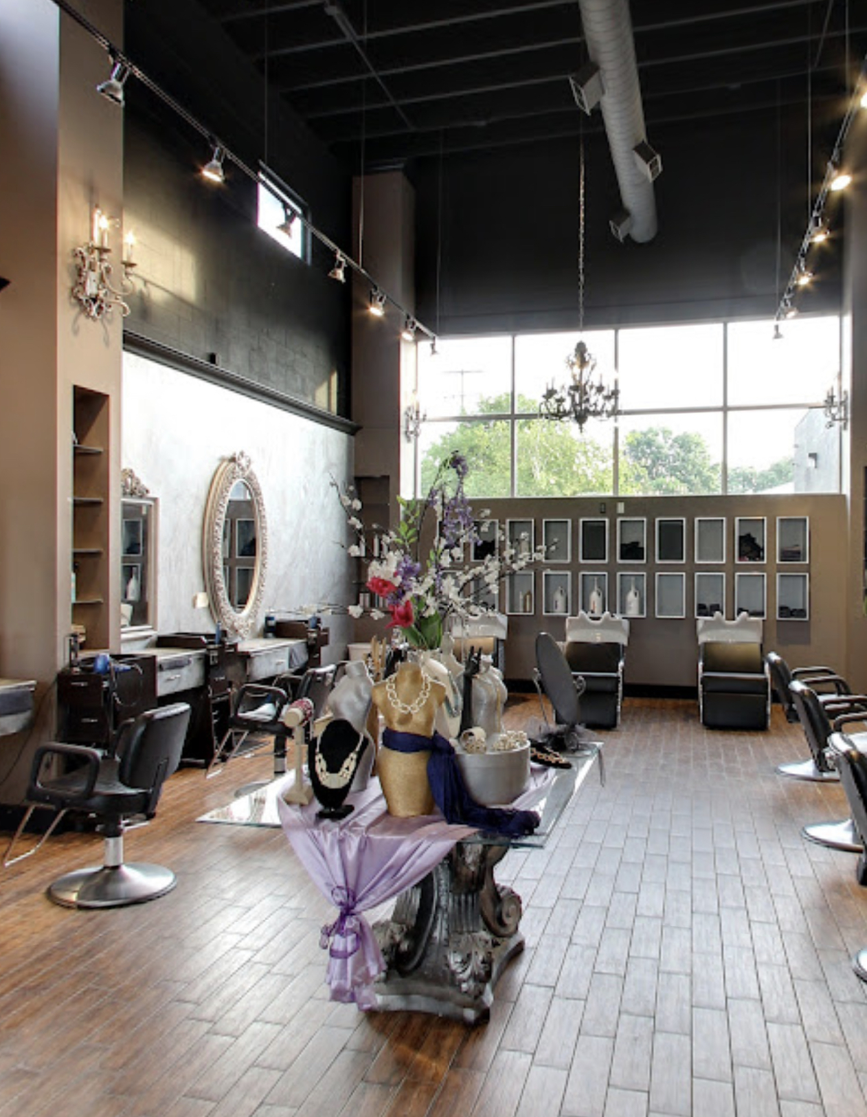 STRAND THEORY SALON BY DERRICK/Sun City Tanning and Hair in Dearborn Heights
